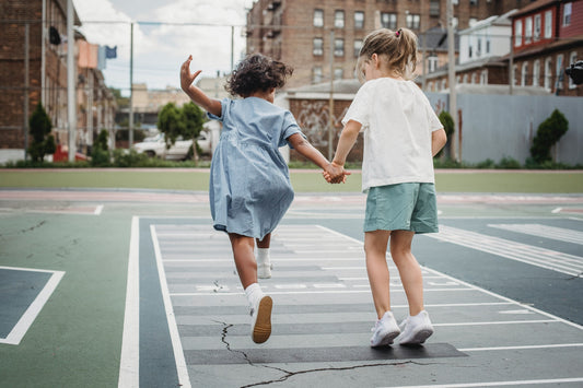 Two-kids-playing-on-court