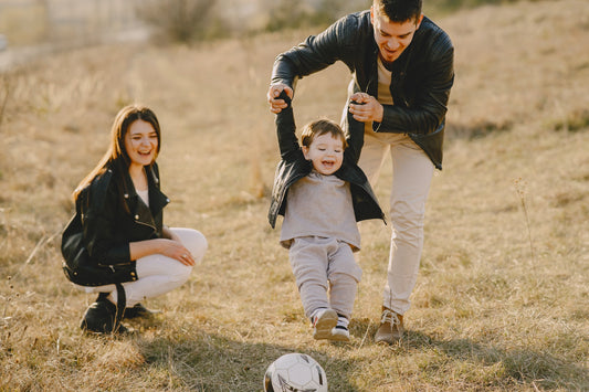 Family-playing-soccer