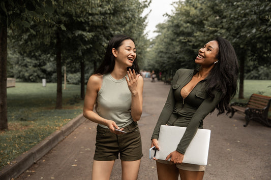 Two-girls-talking-and-laughing