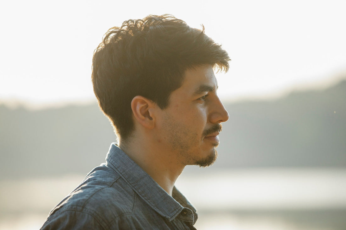 Man-standing-looking-at-nature